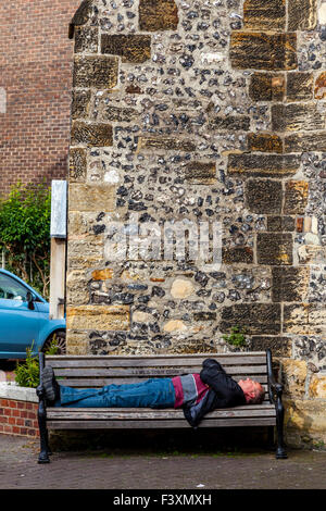 Man sleeping on bench outside Central Park, New York City, USA Stock ...