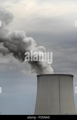 Industrial smoke from chimney on blue sky Stock Photo