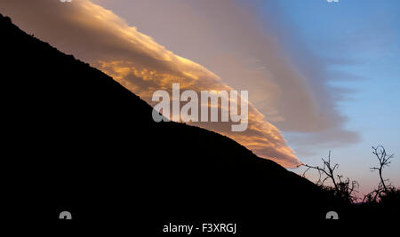 Ominous clouds gathering at sunset in the Gamkaskloof in the Swartberg mountains of South Africa Stock Photo