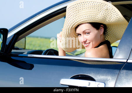 Beautiful woman in wide brimmed hat Stock Photo