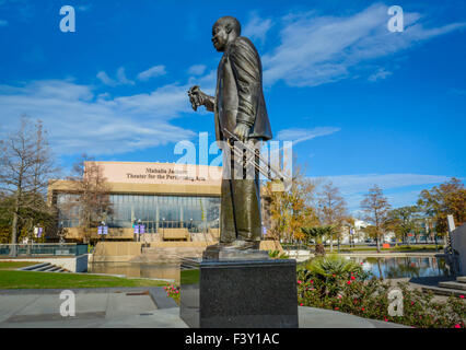 Statue of Louis Armstrong and Mahalia Jackson Theater Performing Arts building in Armstrong Park, Treme area, New Orleans, LA Stock Photo