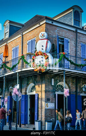Lively tavern with Snowman and holiday decorations on the corner of Bourbon and St. Ann Streets, French Quarter, New Orleans, LA Stock Photo