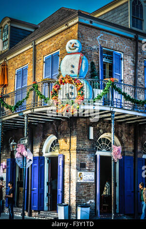 Lively tavern with Snowman and holiday decorations on the corner of Bourbon and St. Ann Streets, French Quarter, New Orleans, LA Stock Photo