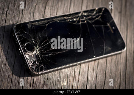 Apple Iphone 5s with a Broken Screen Stock Photo