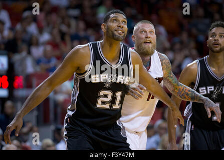 Oct. 12, 2015 - Miami, Florida, U.S. - San Antonio Spurs forward Tim Duncan (21) and Miami Heat forward Chris Andersen (11) share a laugh during a rebound at AmericanAirlines Arena in Miami, Florida on October 12, 2015. (Credit Image: © Allen Eyestone/The Palm Beach Post via ZUMA Wire) Stock Photo