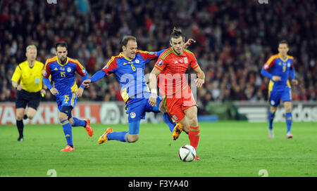 Cardiff, Wales, UK. 13th October, 2015. Euro 2016 qualifying round. Gareth Bale of Wales is tackled by Idefons Lima of Andorra at the Cardiff City Stadium tonight. Credit:  Phil Rees/Alamy Live News Stock Photo