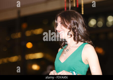 Laughing beautiful young woman in a club Stock Photo