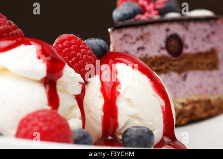 Vanilla ice cream with fresh raspberries Stock Photo