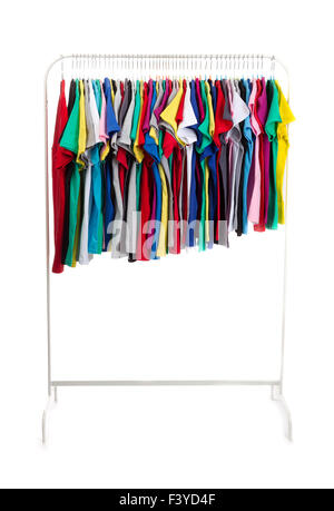 Multicolored clothes on hangers, isolate Stock Photo