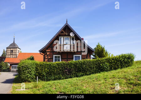 Houses on the dike, Wahrenberg, Saxony-Anhalt Stock Photo