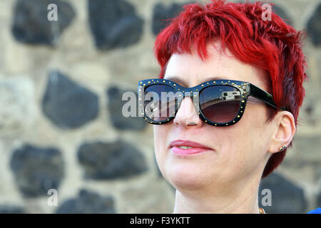 red-haired woman of about 50 Stock Photo