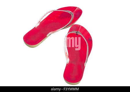 Used red flip flop shoes isolated on white Stock Photo