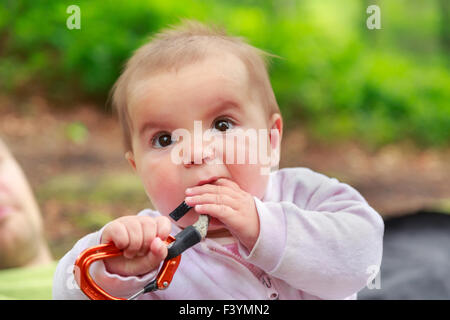 Baby girl eating quickdraw Stock Photo