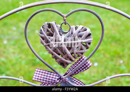 two hearts made from metal and rattan