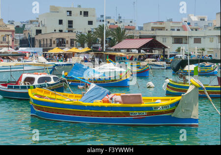 Marsaxlokk Malta FISHING boats in the harbour Stock Photo