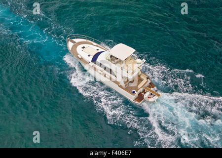 Yacht sailing on sea aerial view Stock Photo