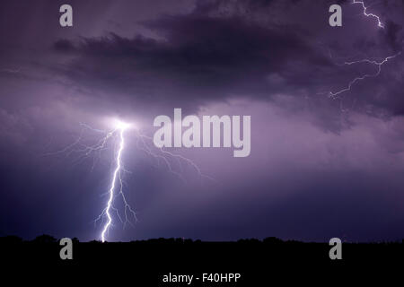 A powerful thunderstorm with intense lightning bolt strikes over Hobbs ...