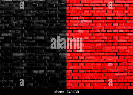 flag of Aosta Valley painted on brick wall Stock Photo