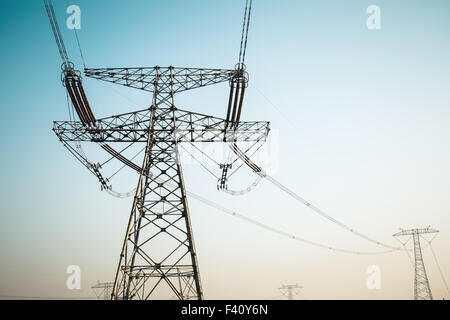 High voltage electric tower on beautiful sky background Stock Photo - Alamy