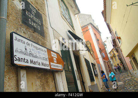 Lisbon, Portugal, 4 October, 2015. People seen on the Rua do Espirito one of the cobbled narrow streets of old Lisbon. Credit: David Mbiyu/ Alamy Live News Stock Photo