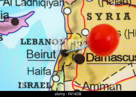 Close-up of a red pushpin in a map of Beirut, Lebanon. Stock Photo