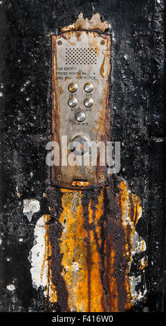 A Rusty Old Buzzer Or Intercom System For Flats In Glasgow, Scotland Stock Photo