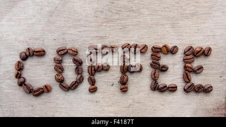 Coffee written with roasted coffee beans Stock Photo