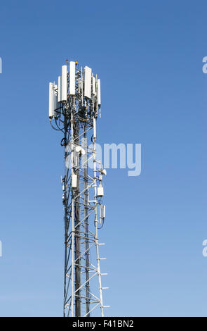 Metallic pole with mobile phone network antennas and electronic equipment installed on it Stock Photo