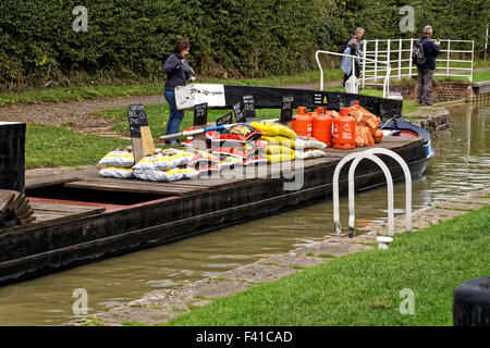 Coal, gas and diesel sales boat on canal. Stock Photo