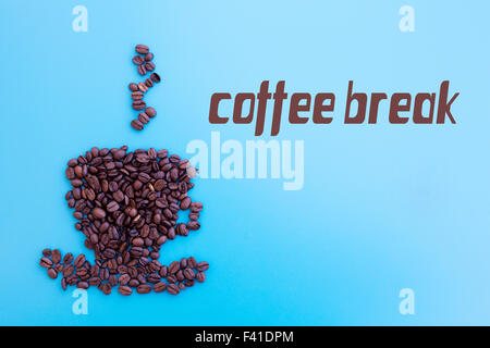 coffee beans in shape of a cup with word 'coffee break' on blue background Stock Photo