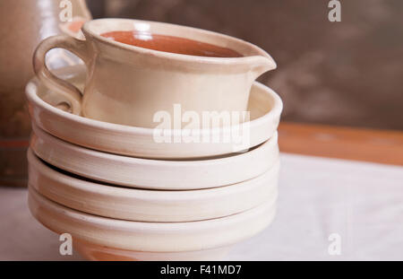 Ceramic plates and a pitcher Stock Photo