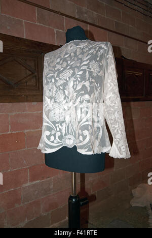 Blouse embroidered on tulle with the technique of Ars Panicalensis, Panicale, Umbria, Italy Stock Photo