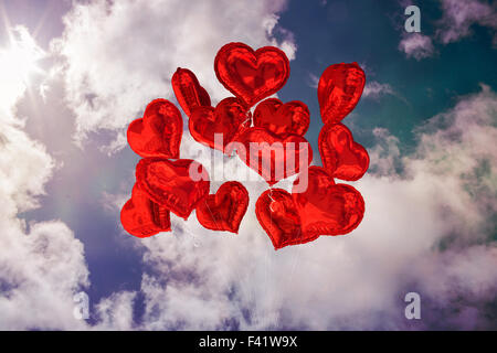 Composite image of heart balloons Stock Photo - Alamy