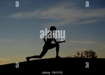 Girl engaged in sports on the nature. Stock Photo