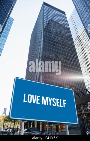 Love myself against skyscraper in city Stock Photo