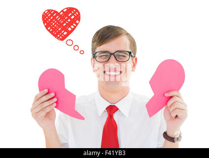 Composite image of broken hearted geek Stock Photo