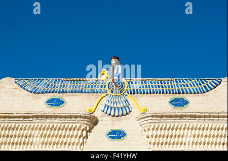 Zoroastrian fire temple entrance with symbol of Zoroastrianism, Faravahar, symbol for god Ahura Mazda, Yazd, Iran Stock Photo