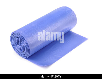 Roll of blue plastic garbage bags isolated on white Stock Photo