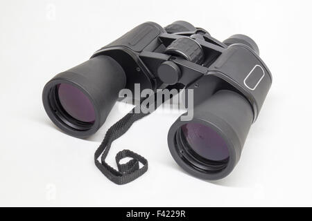 Black binoculars insulated on light background Stock Photo