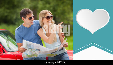 Composite image of cute valentines couple Stock Photo