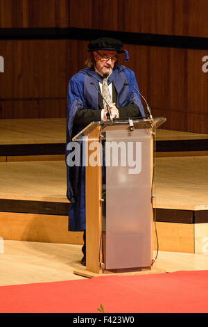 London, UK. 13th Oct, 2015. Malcolm Garrett receiving Honorary Doctorate from London South Bank University at Royal Festival Hall, London, !3th October 2015. Malcolm Garett is a Graphic Designer who designed numerous album covers in the 70s and 80s and went on to become creative director at AIG and later at IMAGES&CO.  In 2003 he was named by Design Week as one of the 'Hot 50 people making a difference in design'. Credit:  Peter Reed/Alamy Live News Stock Photo
