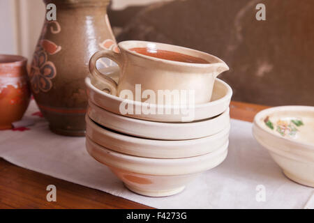 Ceramic plates and a pitcher Stock Photo