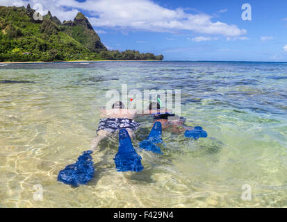 Snorkelers at Tunnels Beach on Kauai Stock Photo