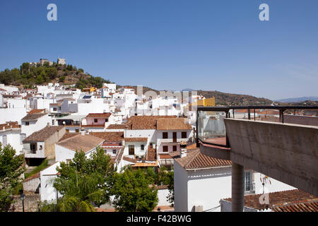 View over town rooftops towards the mountains Monda Andalusia Spain Western Europe Stock Photo