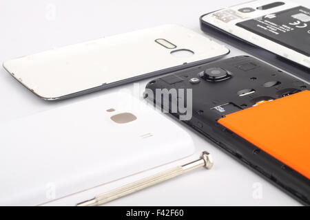 close-up view of a smartphones being opened and repaired Stock Photo