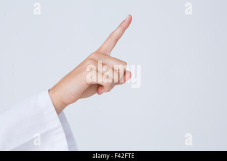 Doctor pointing the finger in the air Stock Photo