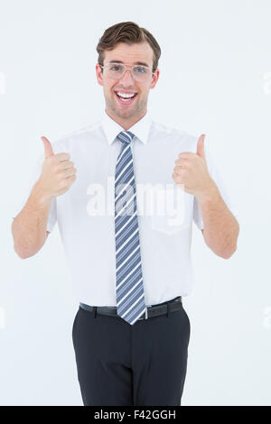 Happy geeky businessman with thumbs up Stock Photo