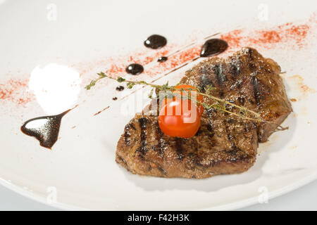 Grilled steaks and vegetables Stock Photo