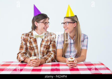 Geeky hipsters celebrating birthday Stock Photo