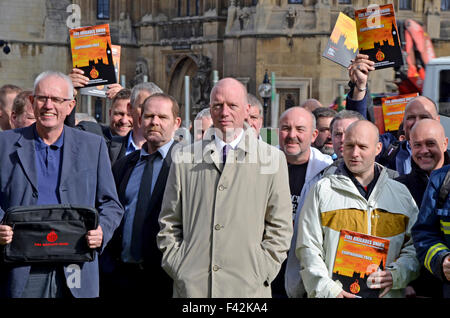 London, UK. 14th October, 2015. Matt Wrack and members of the Fire Brigade's Union prepare to lobby Parliament about the future of the fire and rescue service amid huge concerns about public safety. Credit:  PjrNews/Alamy Live News Stock Photo